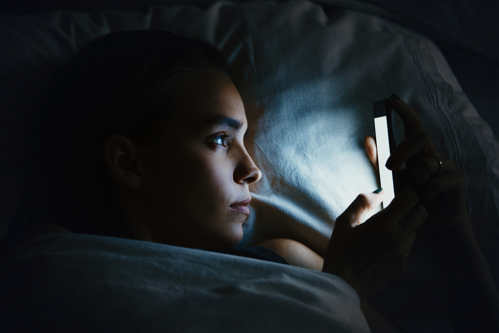 6 Ways To Stop Staring at Your Phone Before Bed